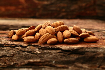 Fresh harvested organic almonds - healthy natural foods background.