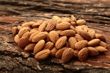 Heap of organic  almonds - healthy vegan diet food.