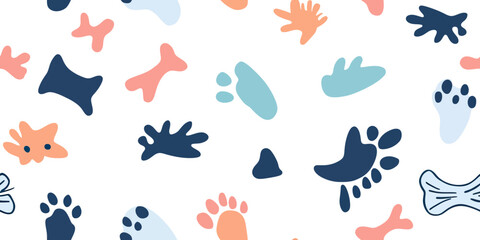 Seamless cat paw print pattern with scattered paw marks and bone shapes in pastel and navy blue on white background vector illustration