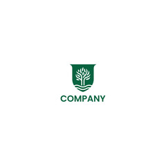 Traditional Green Tree Crest Badge Logo with white background. 