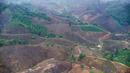 Aerial view of a mountain that has been cut down and destroyed by humans. Bird's-eye view of...