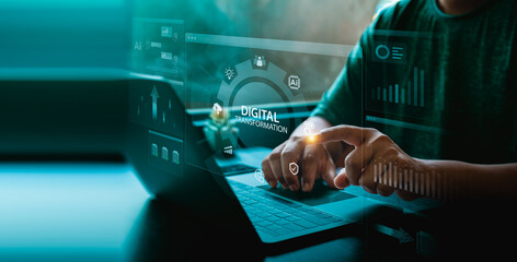 Digital transformation interface on a laptop screen with user touching holographic dashboard, AI icons, charts, and glowing blue data panels representing innovation and smart business technology