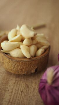 Fresh garlic and onions preparation in a kitchen setting