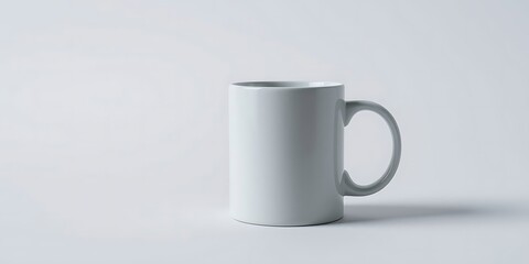 Obraz premium Minimalist presentation of a sleek and elegant white ceramic mug