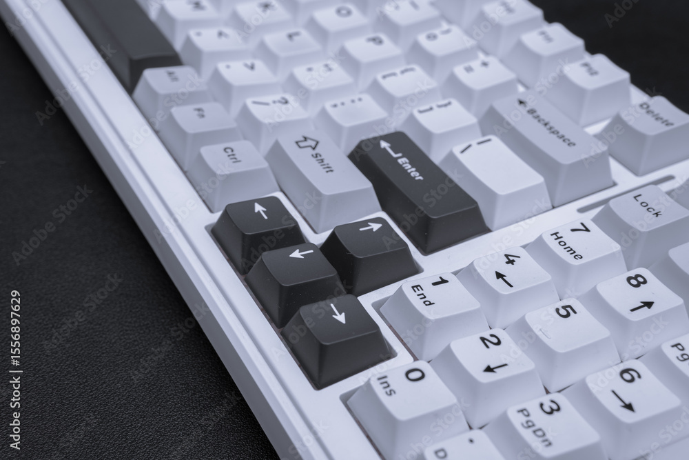 Aufkleber minimalist photograph of a modern white and black computer keyboard for tech articles blog posts or 