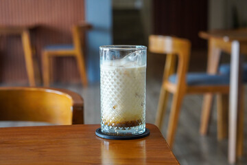 Iced Salted Caramel Latte, Indonesia, captured on June 29, 2025. A refreshing espresso drink mixed with milk and salted caramel syrup, offering a creamy texture and sweet-salty flavor.