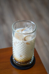 Iced Salted Caramel Latte, Indonesia, captured on June 29, 2025. A refreshing espresso drink mixed with milk and salted caramel syrup, offering a creamy texture and sweet-salty flavor.