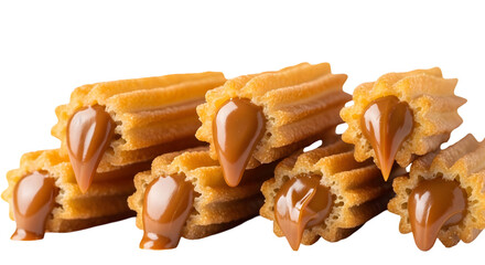 Photo of several golden churros filled with rich caramel are arranged closely together, isolated on transparent background