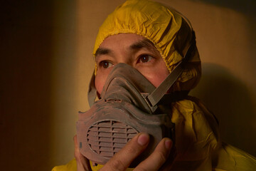 portrait of a man in yellow costumeman with mask