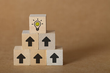 Innovation Rising: Lightbulb Symbolizing Ideas Emerging from Progressive Growth