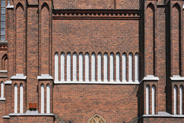 Historic church brick architecture during the day at the entrance