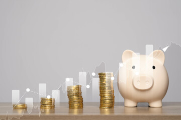 A piggy bank sits alongside stacks of coins, with a graphic overlay depicting financial growth...