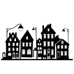 Silhouette of small town houses and street lights