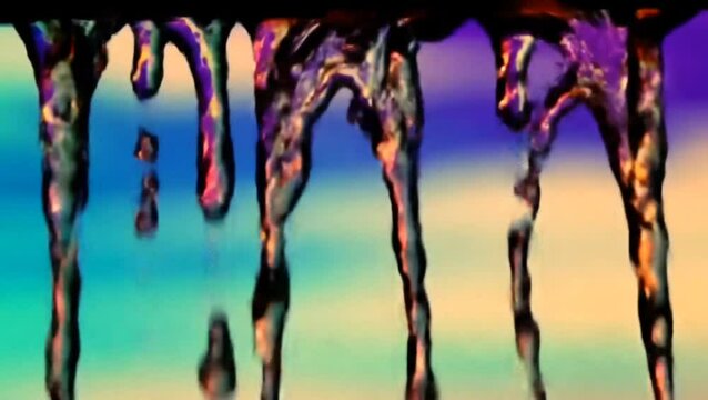 Melting colorful liquid texture flowing downward, seamless looping 4k time-lapse animation video background
