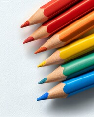 Fototapeta premium Colorful pencils arranged with vibrant tips.
