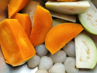 Fresh Raw pieces of fruits Mango, Guava and Lichi served for eating at Summer.