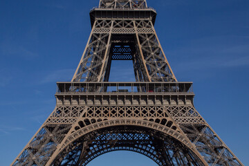 enter part of Eiffel 
Tower in Paris against blue sky