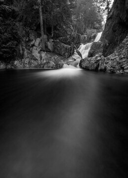 black and white of tranquil peaceful waterfall near Rangeley, maine