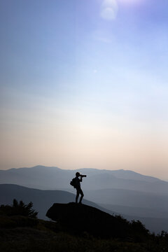 Hiker takes photo from Saddleback Mountain, Appalachian Trail, Maine