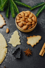 Christmas cookie dough and baking scene with rolling pin, eggs and spices for seasonal preparation...