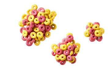 heap of corn rings and strawberry rings isolated on white background top view. corn flakes fruity loops colorful hoops.