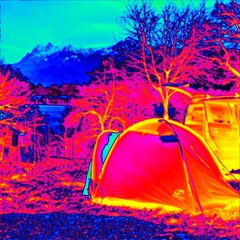Camping at lake. Car with tent and caravan. Thermal photography