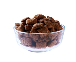 tasty chocolate pillows in a clear glass bowl isolated on a white background.