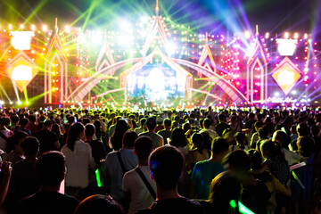 Group of people are watching a rock concert