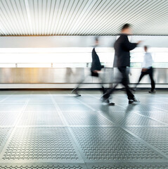 Business people walking on footbridge