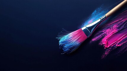 Fototapeta premium Close-up of a paintbrush with a wooden handle and blue and pink bristles. the brush is lying on a dark blue background.