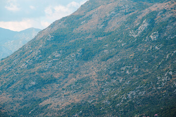 Wilderness mountains reaching into the blue sky