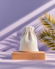 Silver Textured Pouch on Wooden Platform with Palm Leaves