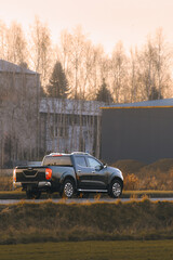 Luxury pickup truck in rural setting