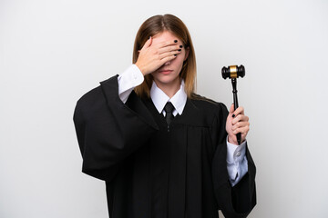 Judge English woman isolated on white background covering eyes by hands. Do not want to see...