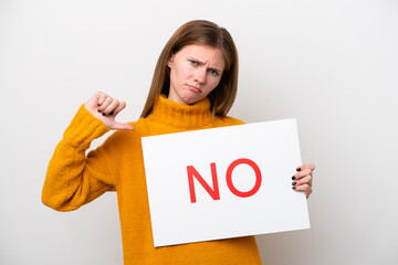 Young English woman isolated on white background holding a placard with text NO