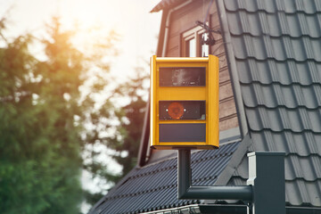 Obraz premium Speed camera monitoring traffic in European neighborhood