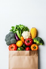 Healthy Vegan Food in Paper Bag, Vegetables and Fruits on White Background. Delivery vegetarian