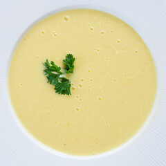 corn Soup in white plate in the coffee shop