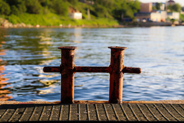 Naklejka premium Bollard and ropes. Seaside vacation. Yachting. Sea travel.