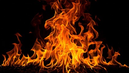 Close-Up of Curling Fire Against Black Background