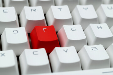 Modern keyboard with red letter f button