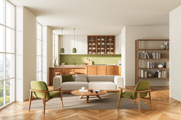 Modern open living room and kitchen interior with green accents, wooden furniture, and natural...
