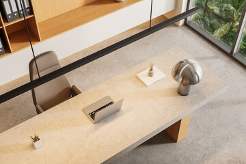 Modern minimalist office desk with laptop, lamp, and decor in bright workspace with tropical view and clean interior concept design style. 3D Rendering