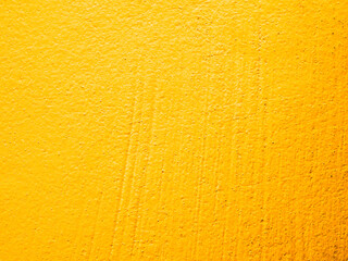 Yellow cement background summer wallpaper banner, plaster stucco wall floor backdrop.
