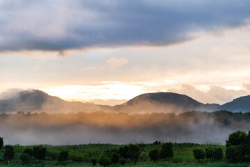 Landscape of mountain covered fog