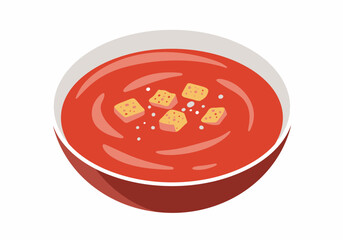 Red tomato soup in a bowl garnished with croutons and spices
