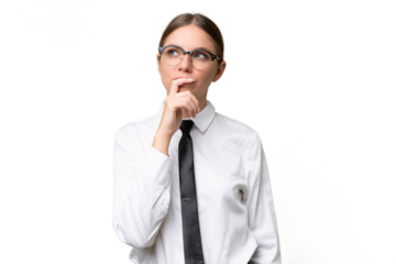 Young business caucasian woman over isolated background having doubts and with confuse face expression