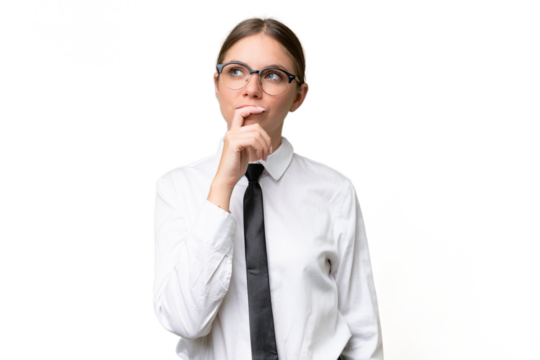 Young business caucasian woman over isolated background having doubts and with confuse face expression