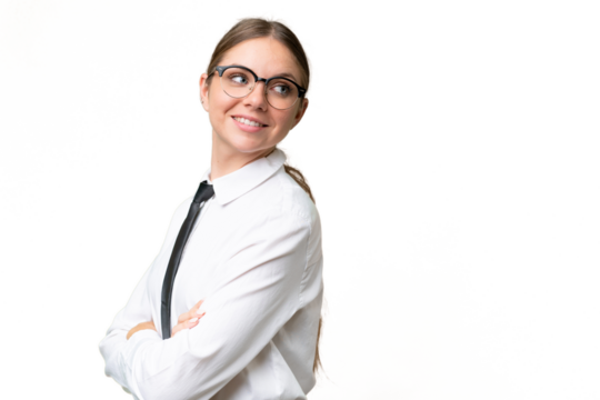 Young business caucasian woman over isolated background with arms crossed and happy