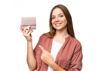 Young blonde woman holding a wallet over isolated chroma key background and pointing it
